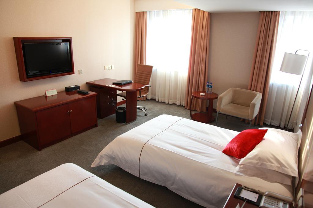 New Gloria Plaza Garden Hotel Harbin Quarto foto