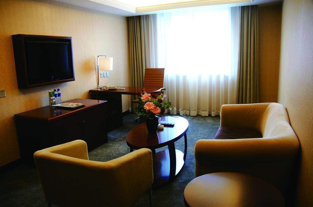 New Gloria Plaza Garden Hotel Harbin Exterior foto