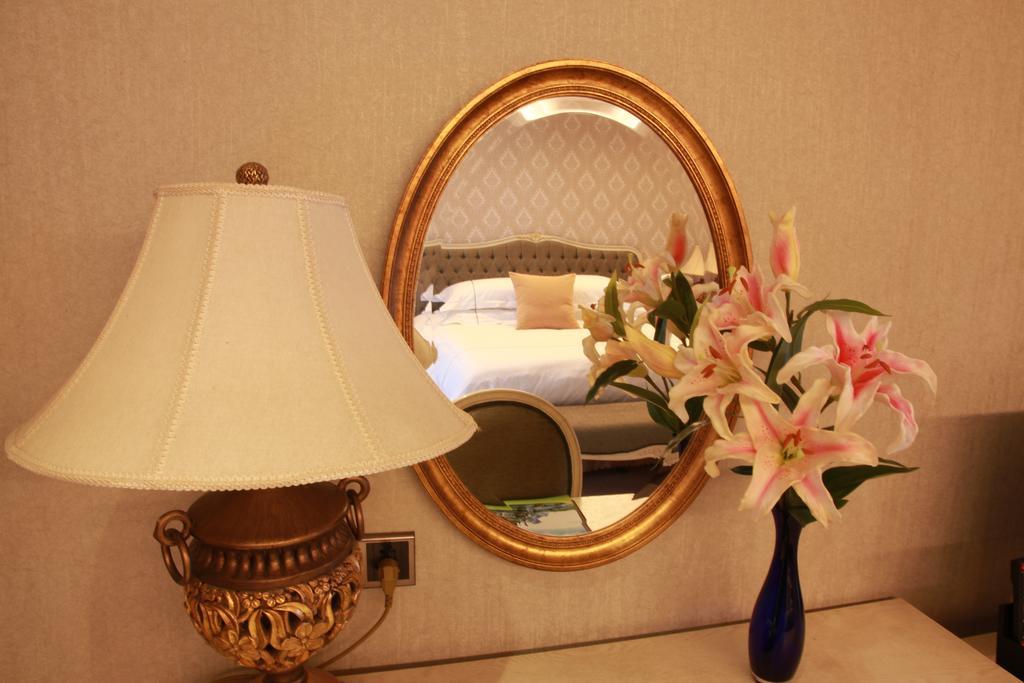 New Gloria Plaza Garden Hotel Harbin Quarto foto