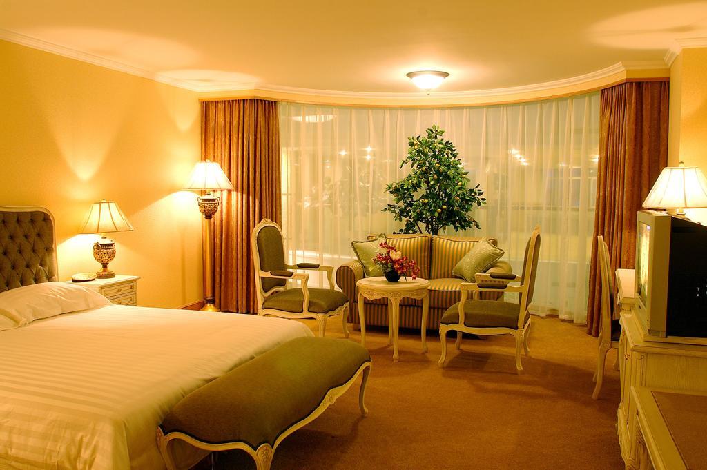 New Gloria Plaza Garden Hotel Harbin Quarto foto
