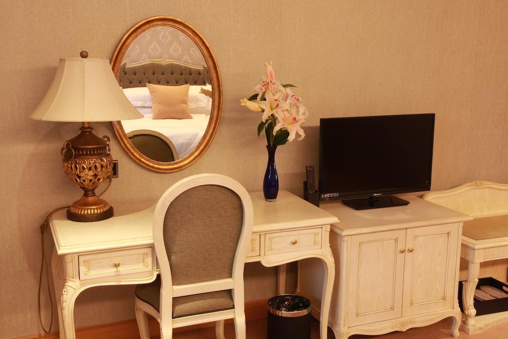 New Gloria Plaza Garden Hotel Harbin Quarto foto