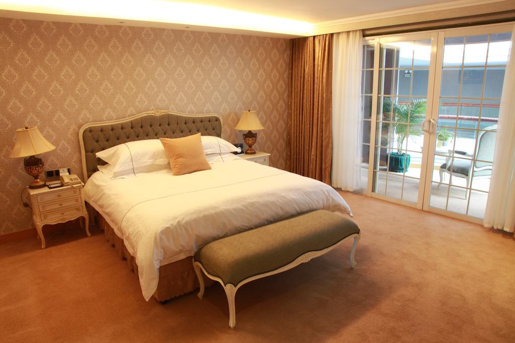 New Gloria Plaza Garden Hotel Harbin Quarto foto