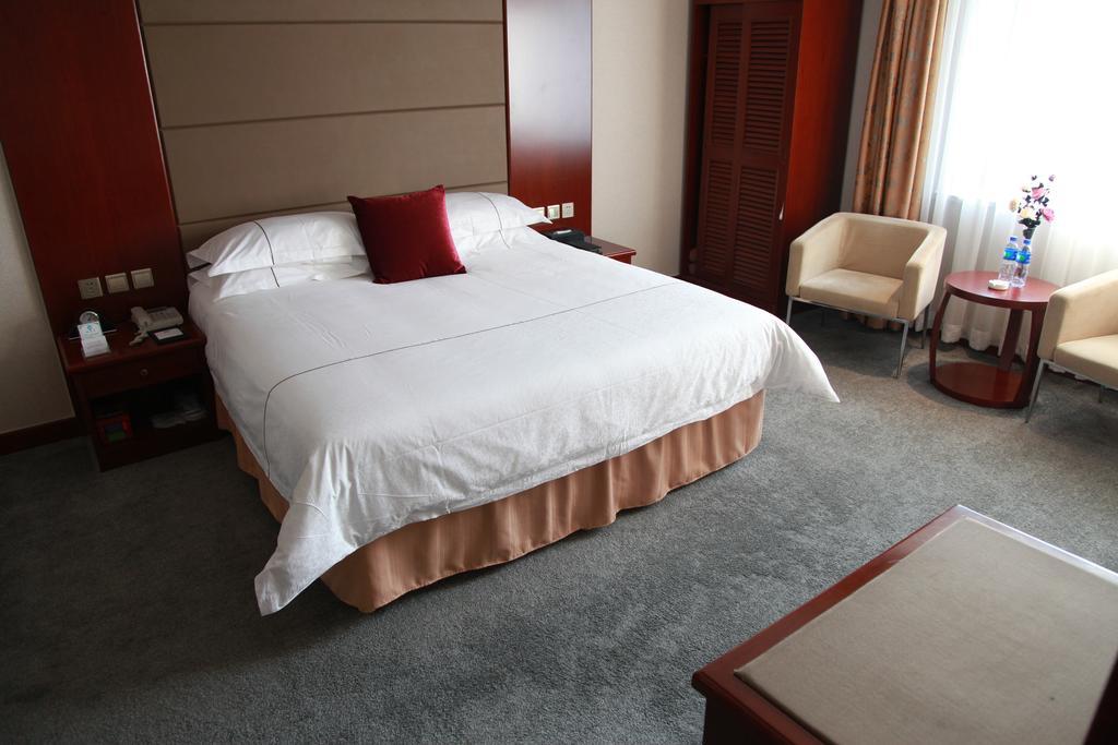 New Gloria Plaza Garden Hotel Harbin Quarto foto
